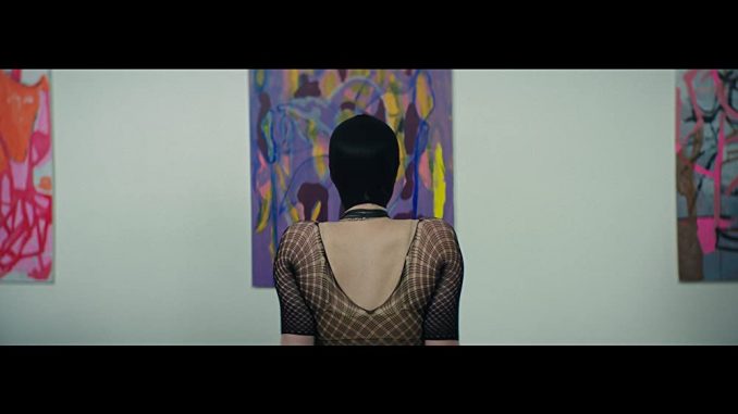 A wealthy art collector is obsessed with a young artist in "Painter"