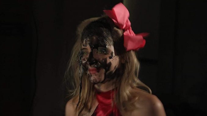 The demon possessing an old hotel terrorizes a young couple in "The Overnight"