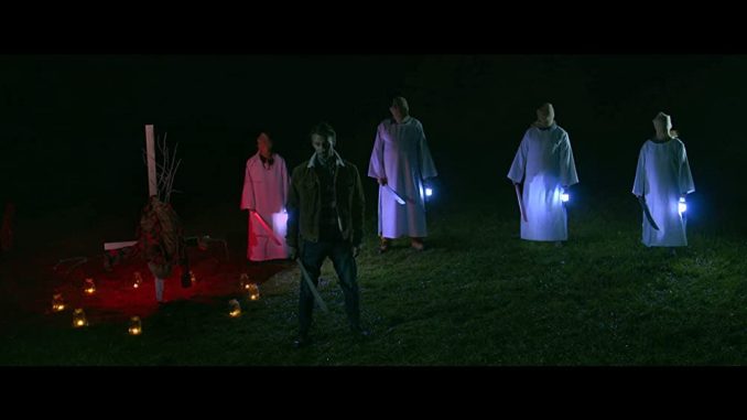 A man must fight a cannibal cult in "The Devil Comes at Night"